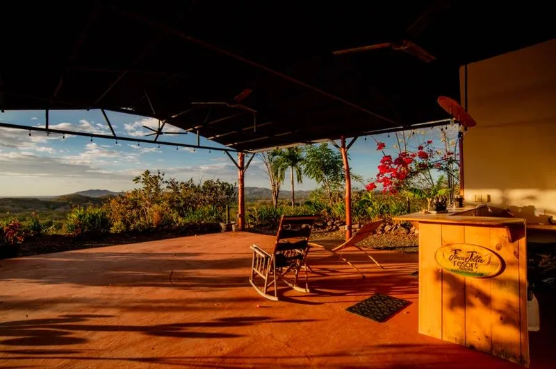 The Yoga Studio floor in golden-hour light, open to the valley on every side