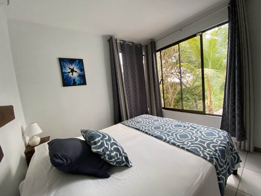 The second bedroom at Casa Sol, open to the garden