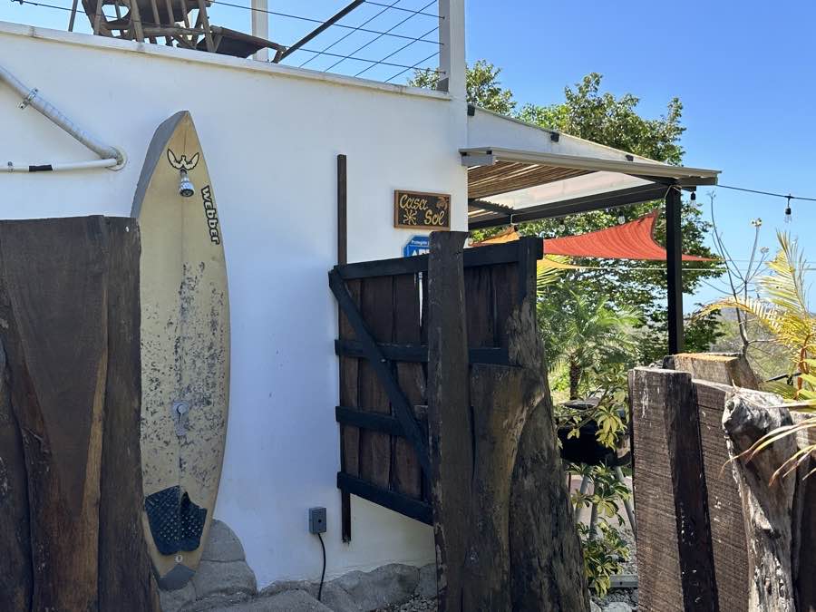The Casa Sol sign at the garden gate